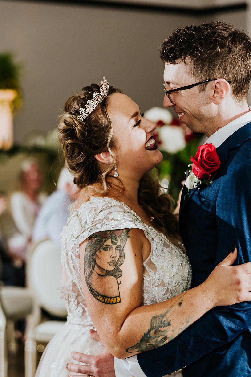 Tattoo bride and groom first dance at Carmon Hotel in Hamilton photo by Fedora Media.jpg