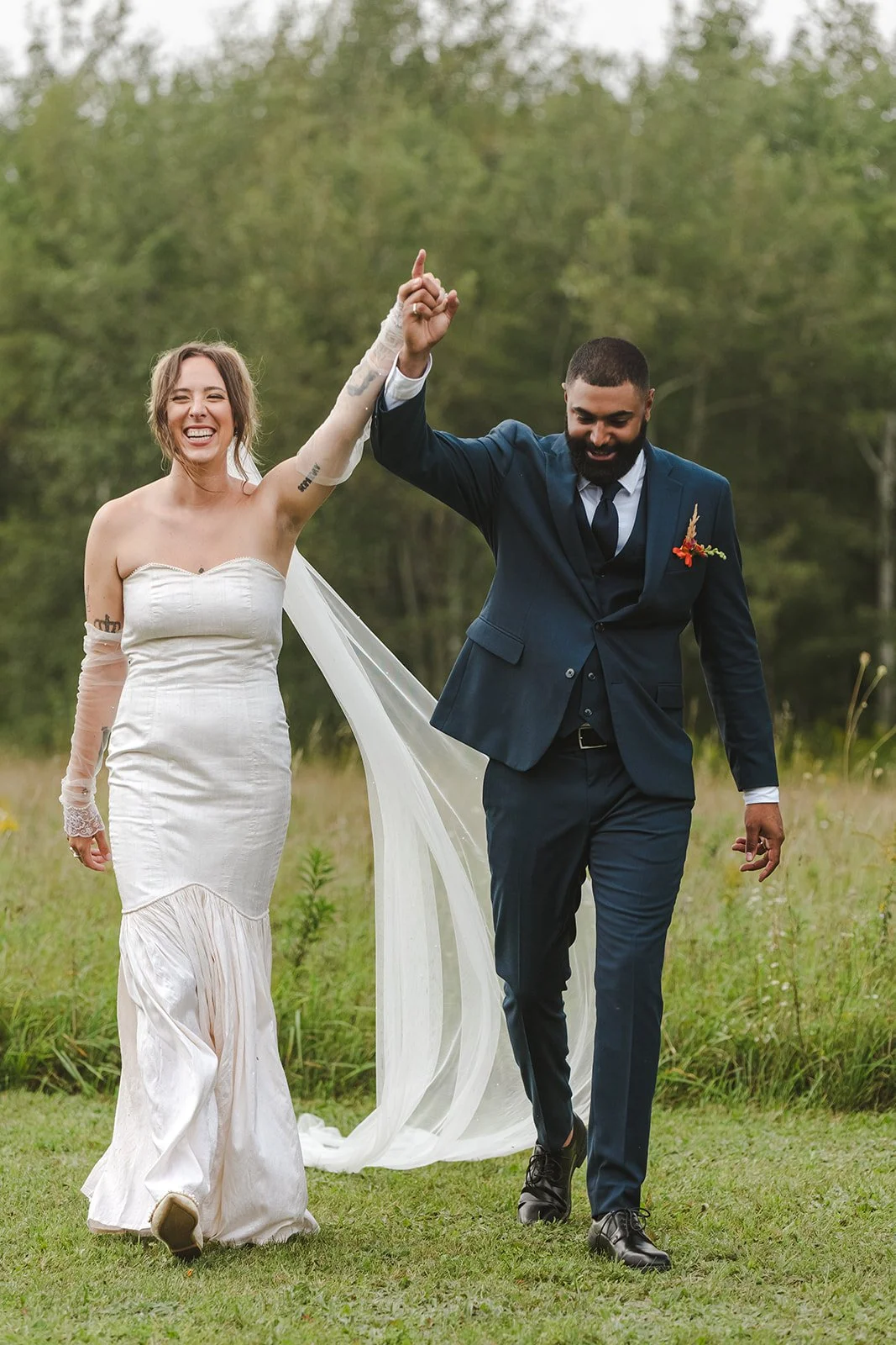 Bride and Groom Celebrate During Wedding Ceremony  Fedora Media  Backyard Wedding.jpg