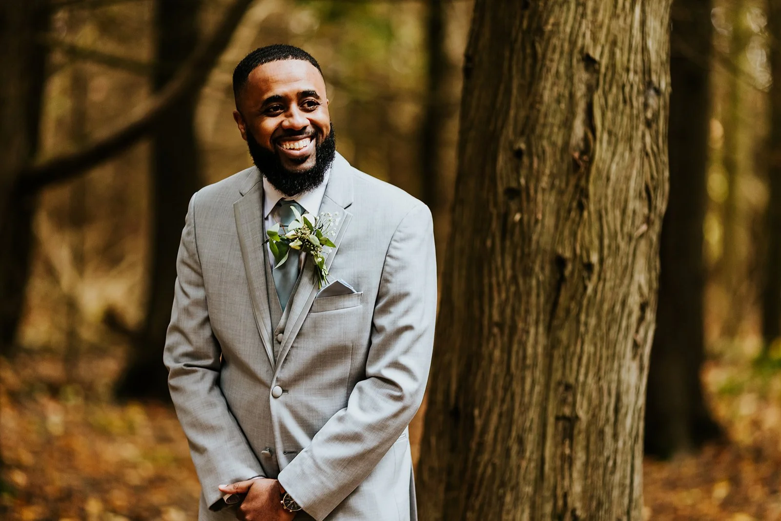Groom smiling when his bride walks down the isle photos by fedora media.jpg