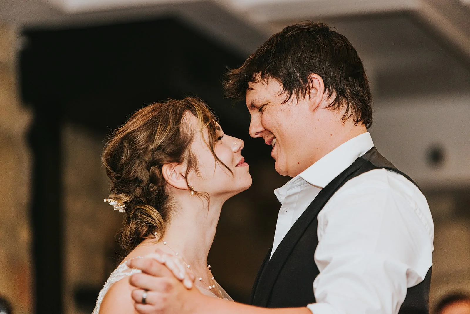 Bride and Groom look lovingly at each other.jpg