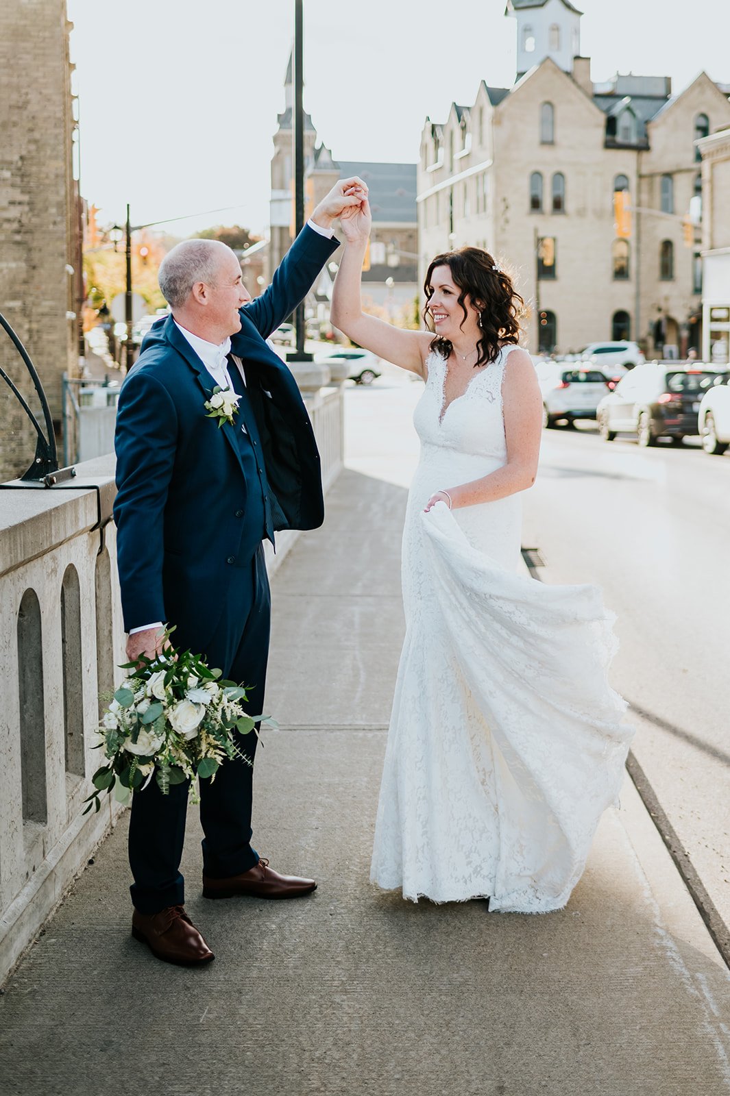 Bride and groom dance in the street in Paris Ontario photo by Fedora Media.jpg