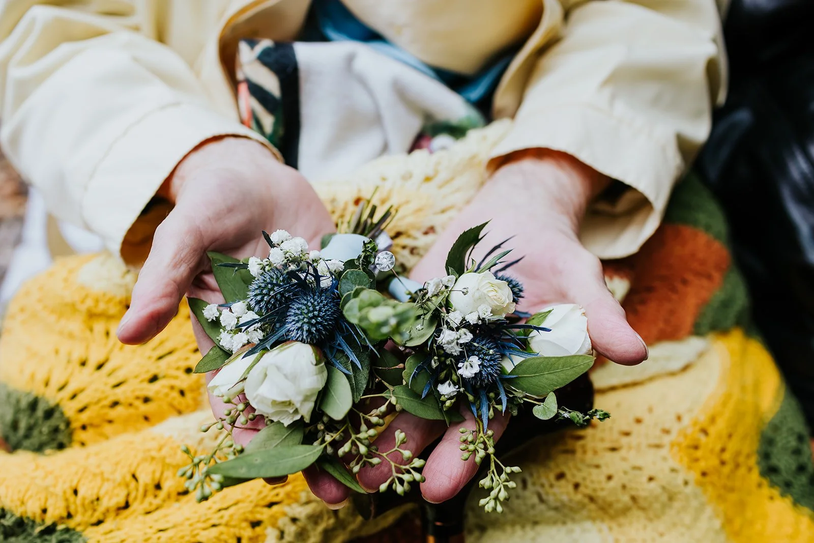 Grandma holding wedding flowers photos by fedora media.jpg