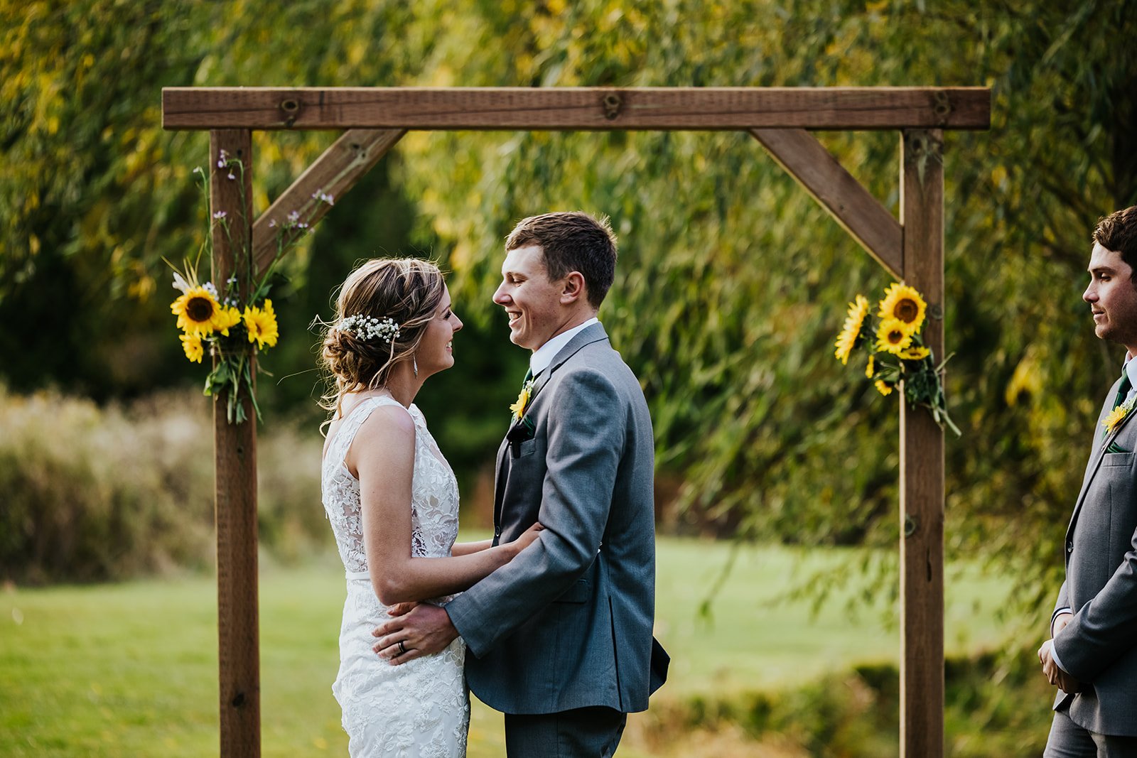 Bride and groom have a private moment at wedding ceremony photo by Fedora Media.jpg