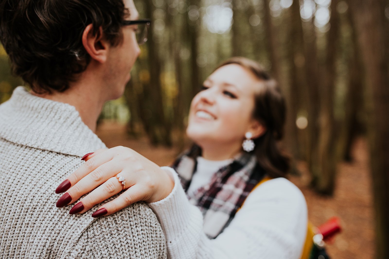Fiance shows off her engagement ring at Victoria Park in Elora photo by Fedora Media.jpg