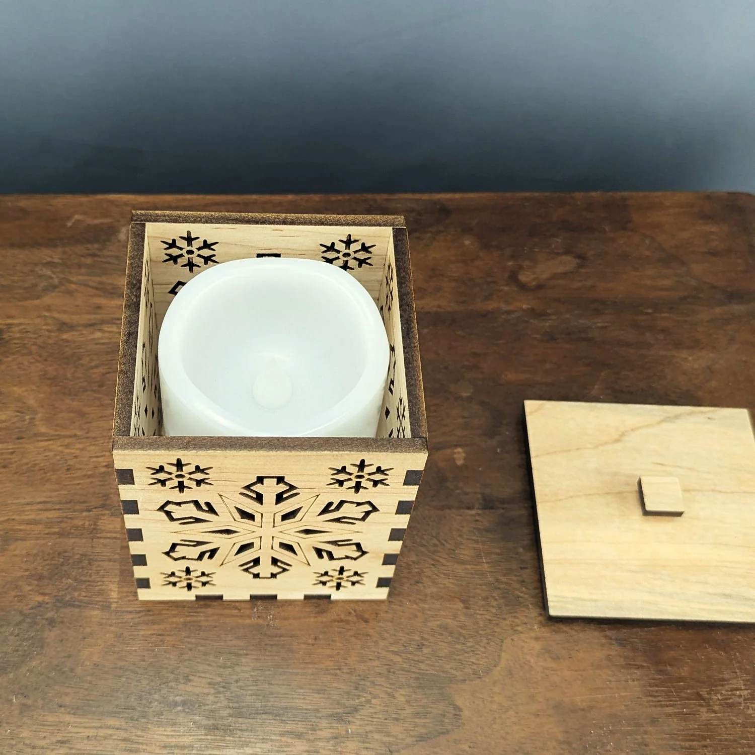 Top view of the Maple Snowflake Lantern with an LED candle placed inside.