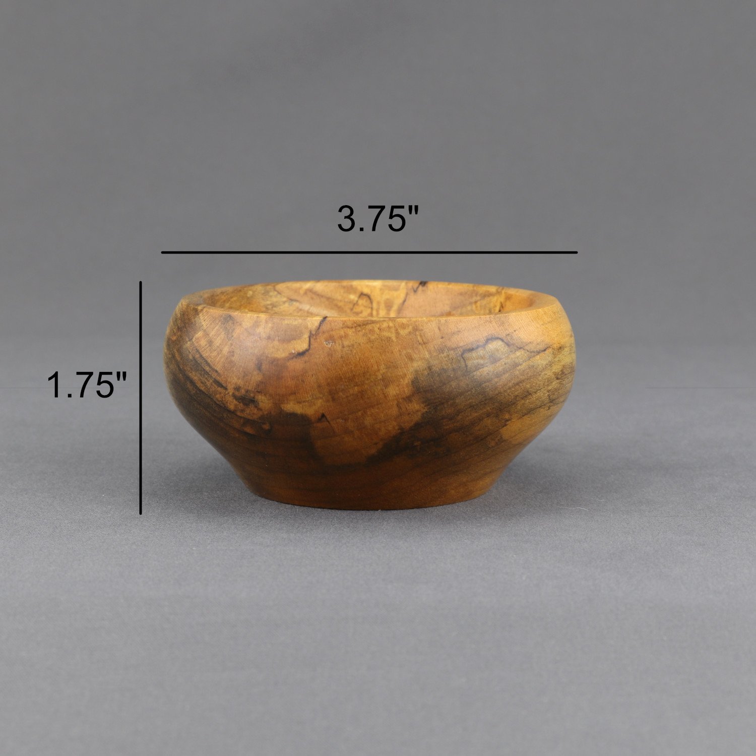 Nature's masterpiece: Handcrafted maple bowl showcases unique wood grain for one-of-a-kind spinning.