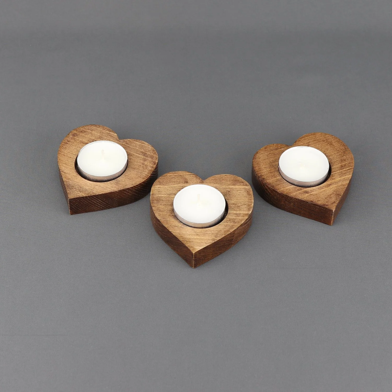 Heart-shaped tealight holders with tealights