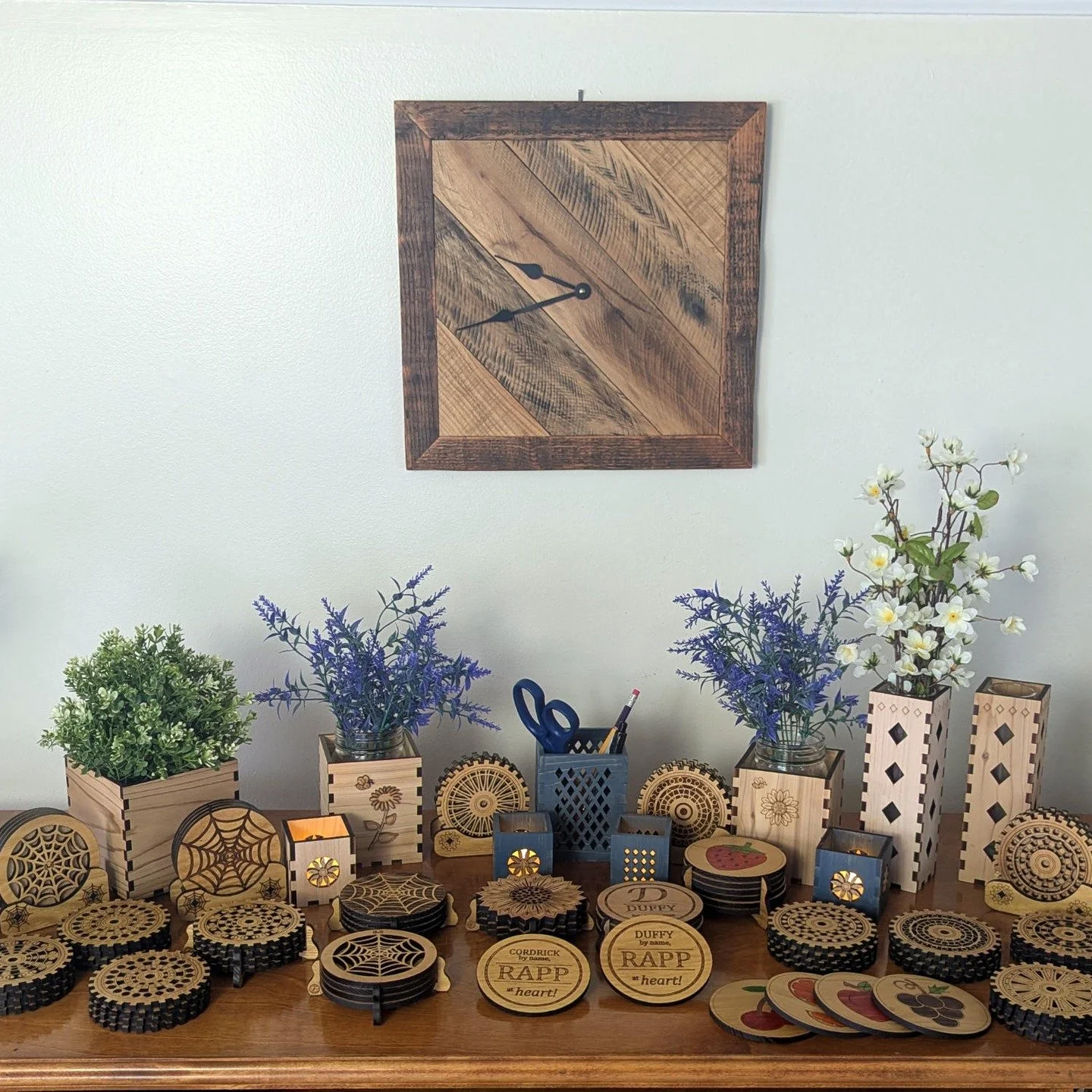 Discover the handcrafted beauty of Cordrick Creations &mdash; a husband-and-wife woodworking studio creating unique laser-cut home d&eacute;cor, coasters, vases, gift sets, and rustic wall art. This display features our Gearworks Collection, Webworks