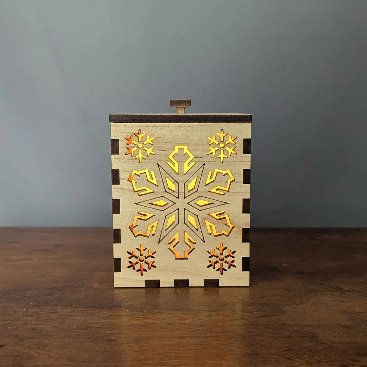 ❄️ Maple Snowflake Lantern ❄️

Winter glow, handcrafted from start to finish.

This Maple Snowflake Lantern begins as locally sourced 5/4 maple that we mill in-house down to approximately 13/64&Prime; before precision laser-cutting each snowflake pan