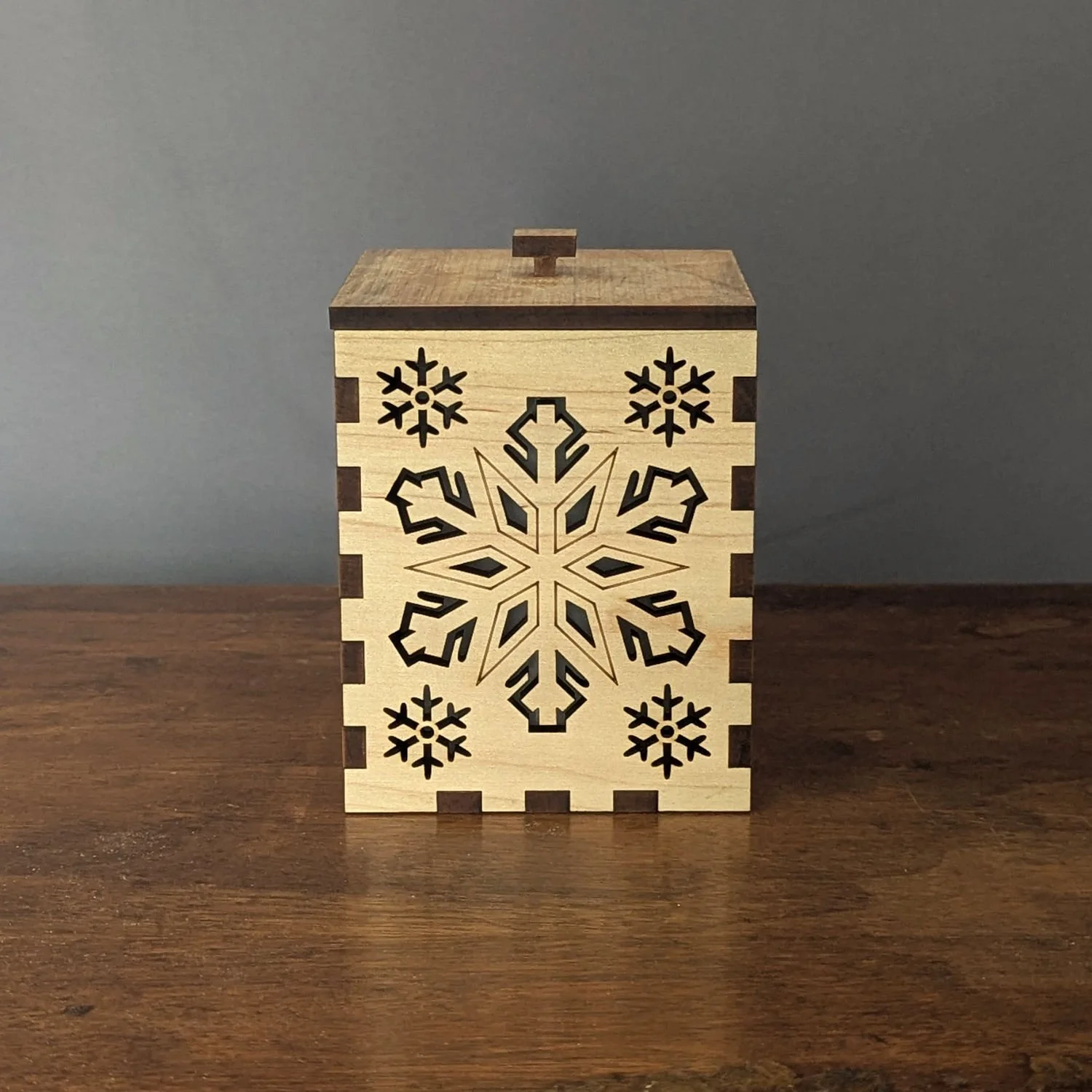 Unlit Maple Snowflake Lantern front view showing precise laser-cut snowflake design.