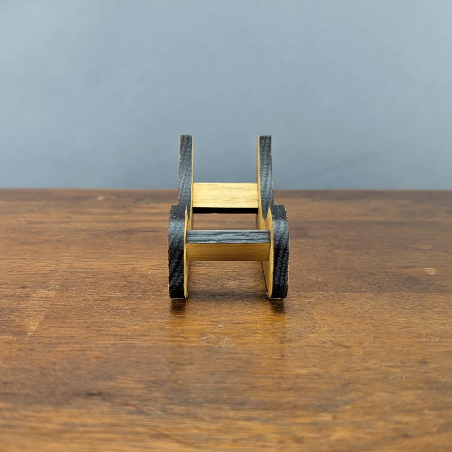 End view of Webworks Coaster Holder with open slot to hold coasters
