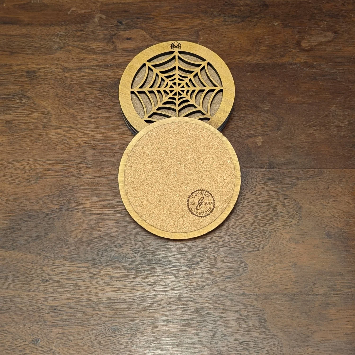 Phantom Web Coaster showing cork backing with Cordrick Creations stamp
