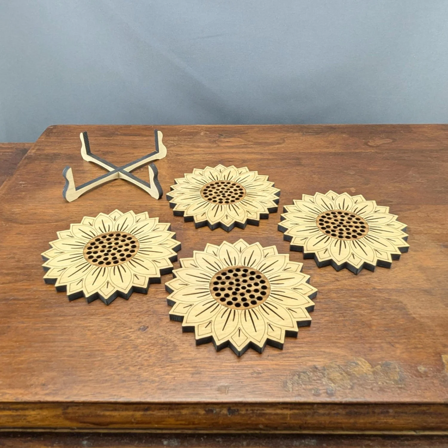 Coaster set displayed on rustic wood table