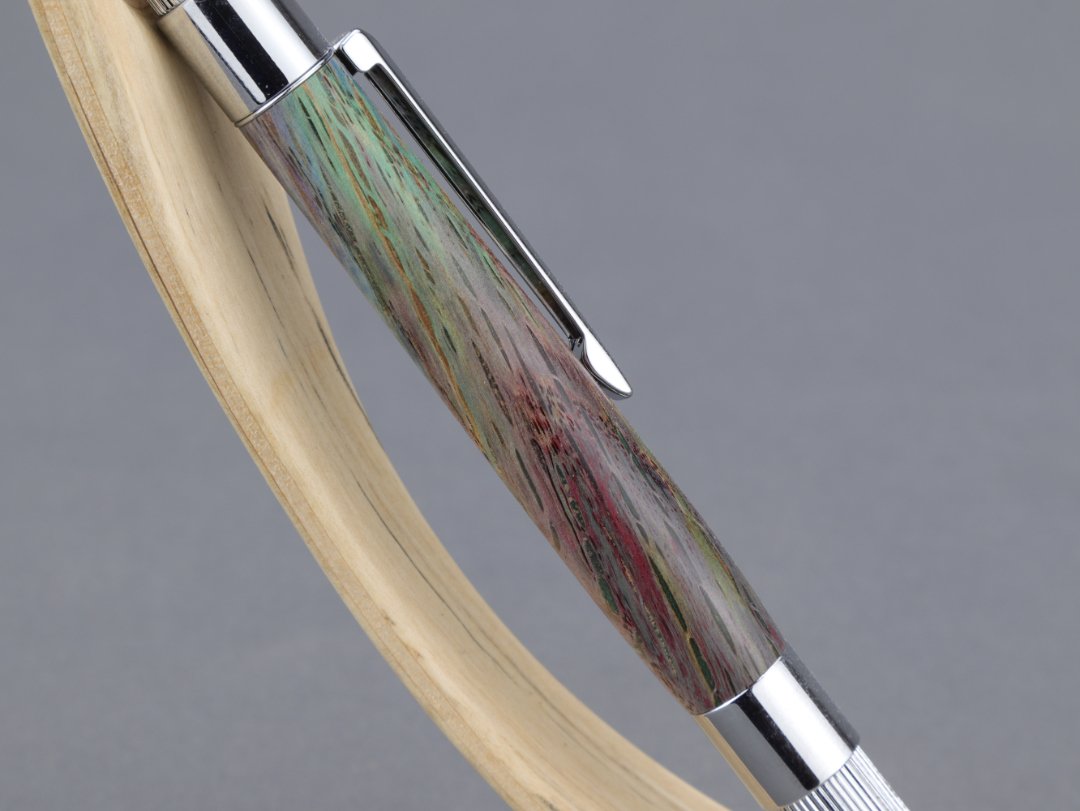 green purple blue wooden pen