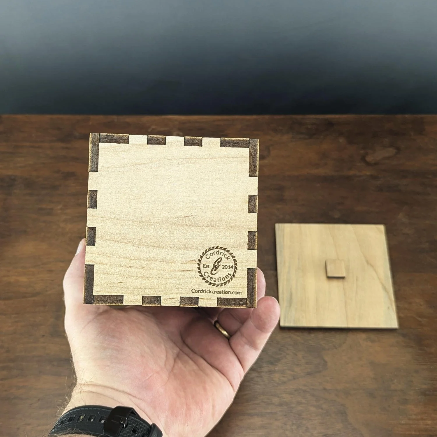 Bottom view of the Maple Snowflake Lantern with Cordrick Creations branding visible.