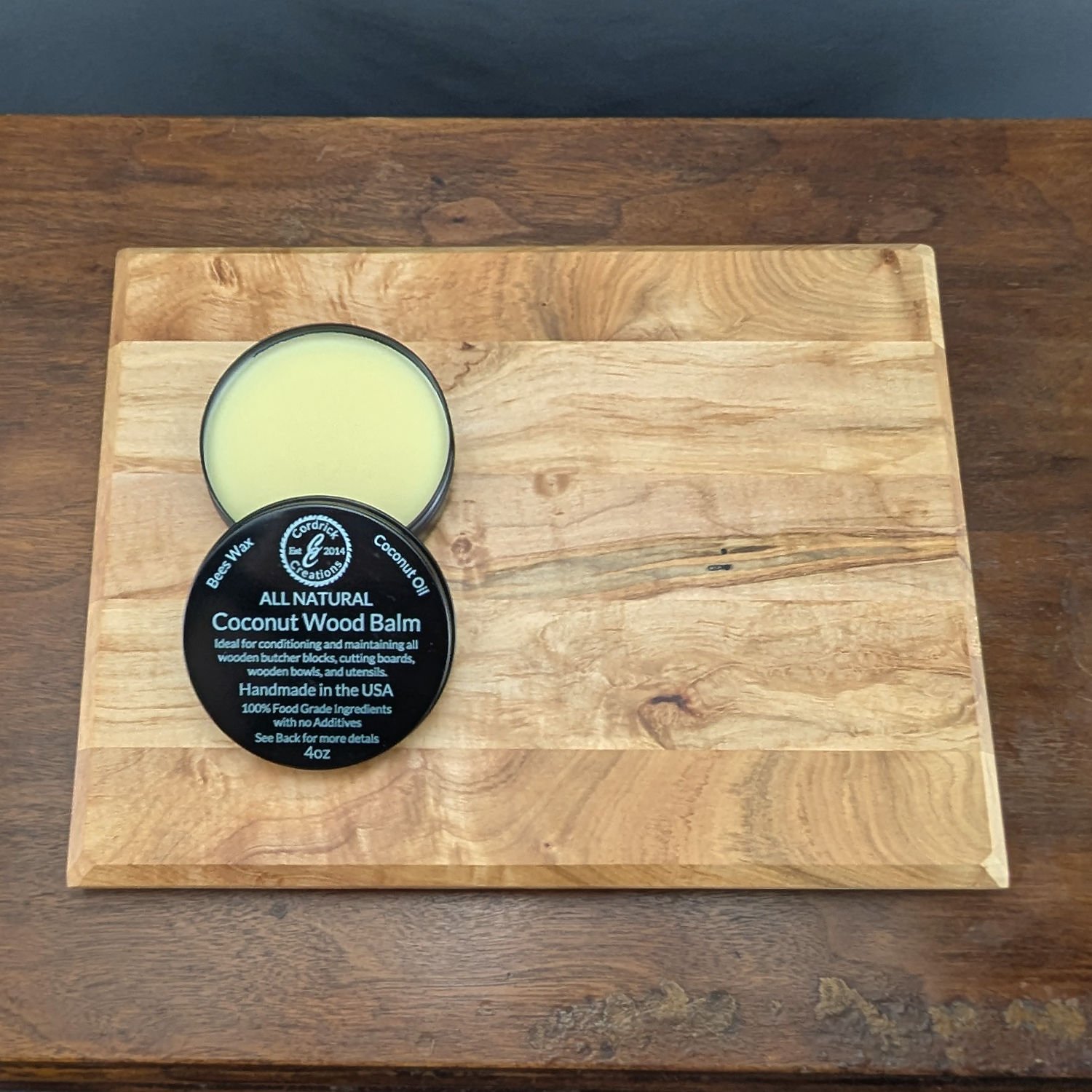 Open tin of Coconut Wood Balm showing smooth texture