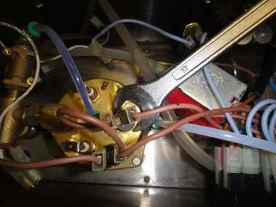 Removing the thermostats is the next step. First loosen them with a 17mm spanner. Then, one at a time, remove the connectors, unscrew the thermostat, replace the connectors. Saves confusion over which wire goes where.