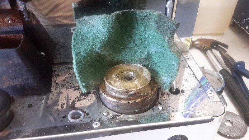 Scotchbrite, detergent and elbow grease now come into play. Every bit of crud is removed until the brass gleams.