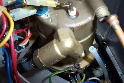 MAJOR TIP: When pulling or pushing teflon tube, use a piece of fine sandpaper or a scotchbrite pad for grip.   Pull the tube off the nipple then undo the hex bolts from the boiler.   The longest bolt (with washer) is the one the earth wires attach to.