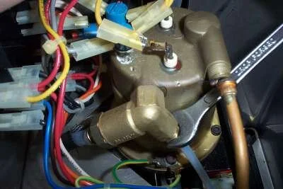 Next is the 12mm compression nut which attaches the teflon pipe from the pump to the boiler.