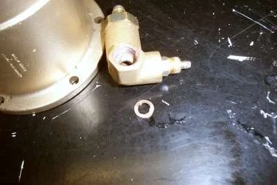 Now comes the most difficult part of the whole process.   Inside the OPV there&nbsp; may&nbsp; be a copper compression spacer washer or two, or three.   Even if there isn't, you might need a combo of thick and thin washers to get the OPV  tight , in the correct position, on the new boiler.