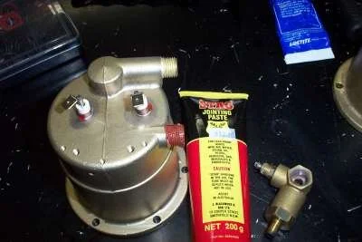 MAJOR TIP: Play with various washer combinations until you can screw the valve up TIGHT in the correct position.   Once the washers are right, I anoint the threads with pipe sealant, then use 10cm of teflon tape on top of the sealant.