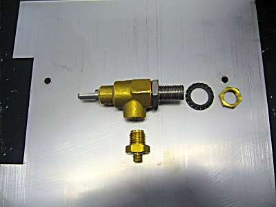 You now have to undo the stainless steel bit from the brass part of the valve. I find it easiest to lock the brass bit in a vice first.