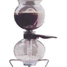 I then place the assembled syphon on to a hotplate - gas or electric is O.K., - and this is where the interesting bit starts to happen.   The build up of steam in the lower bowl forces the water up into the funnel, where it mixes with the ground coffee.   A quick stir wets the grounds into the water, and a small amount of water left behind in the bowl keeps the steam coming and the temperature constant.   Brewing continues for 2 minutes ( it can go longer but you don't get any more flavor) and I then take the syphon off the hotplate.