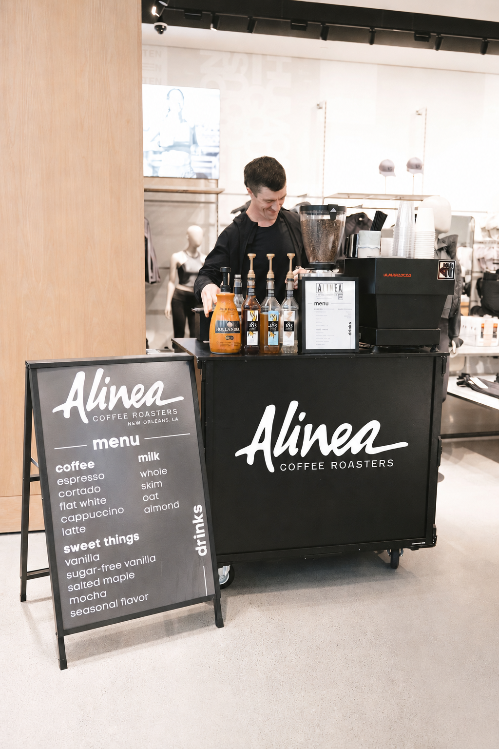Alinea espresso cart kiosk in a retail space