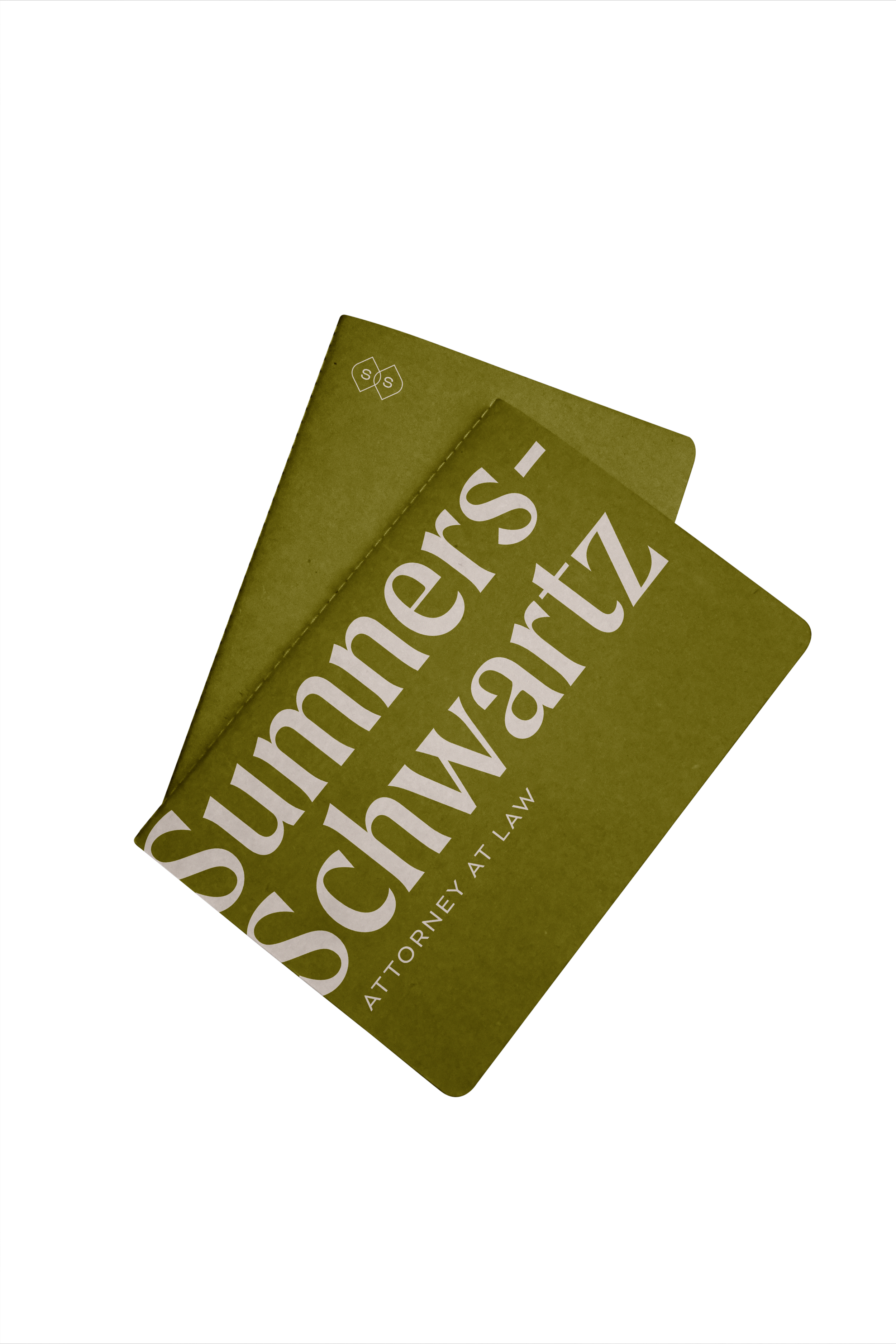 Green business card or flyer with white text reading 'Summners-Schwartz', and smaller text 'Attorney at Law'.