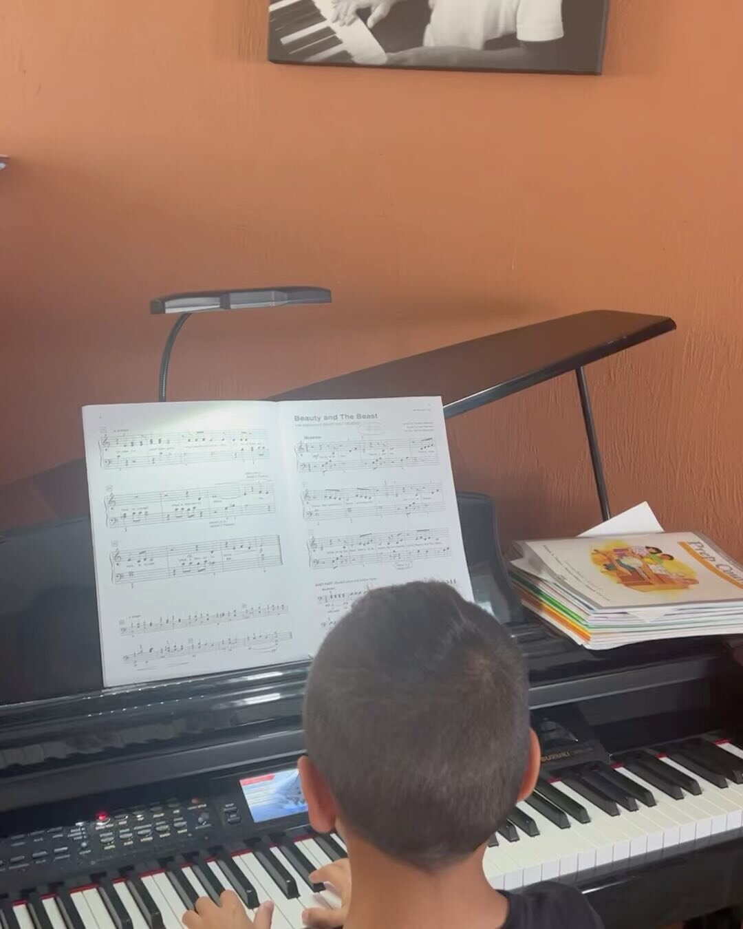 Name this tune! On the 4th slide, check out my duet with my piano instructor. We are so incredibly proud of Mick! #GrandmaHyacinthInHeavenisProudToo #piano #7yearsold #DisneyClassic #BeautyandtheBeast