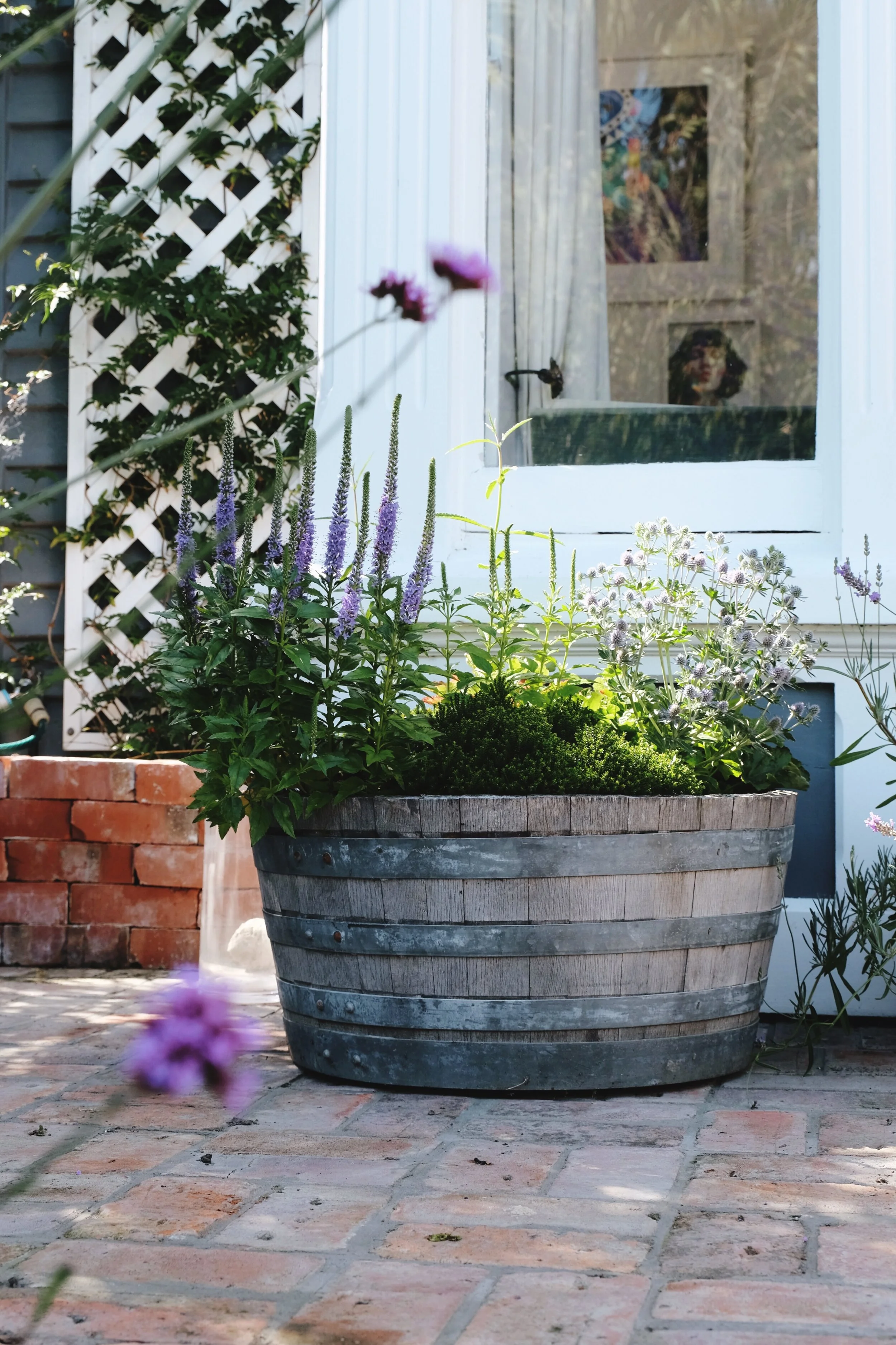 Converting a wine barrel into planters 