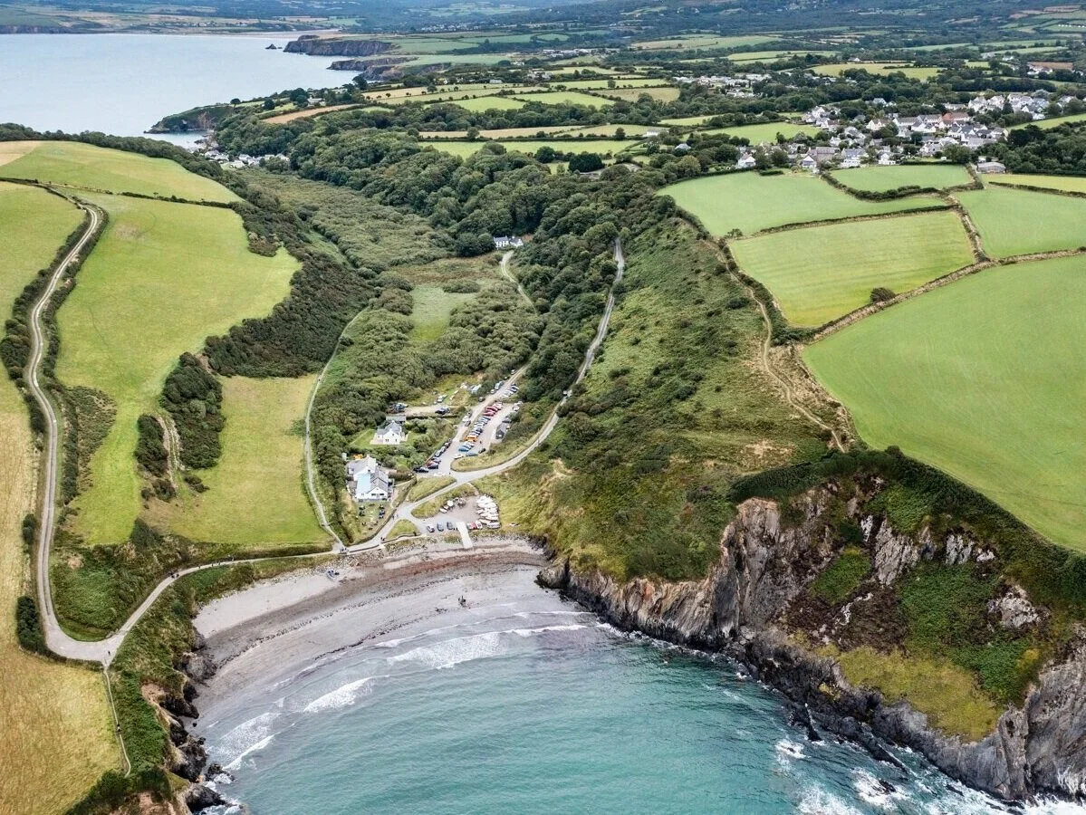 Sailors Cottage ariel view over Pwllgwaelod beach - The Pembrokeshire Holiday Company
