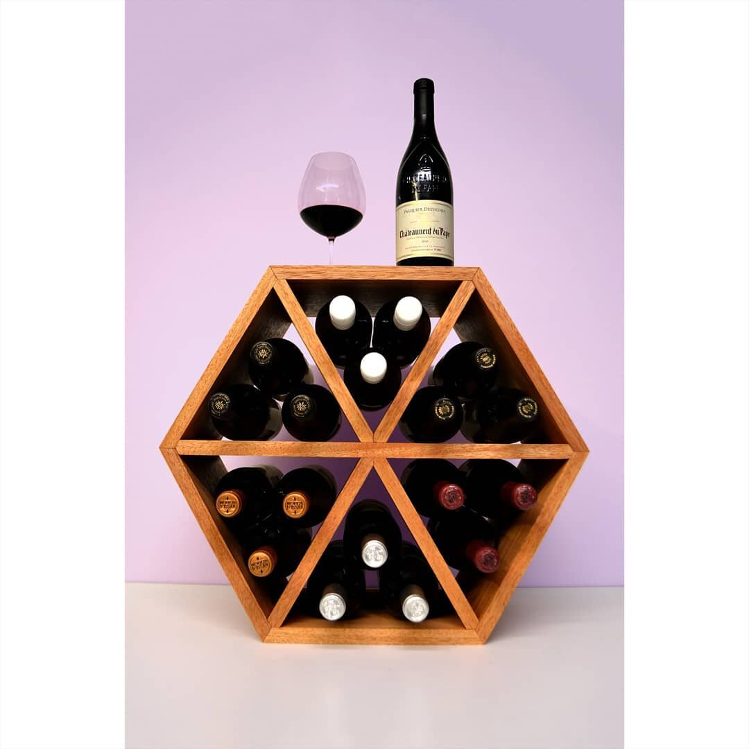 This sleek, stylish and multi-functional wine rack can hold up to 18 of your finest wines. Subtle enough to work as a side table, but striking enough to use as a stand-alone feature piece, the wine rack is a perfect addition to your home.

Using 11 p