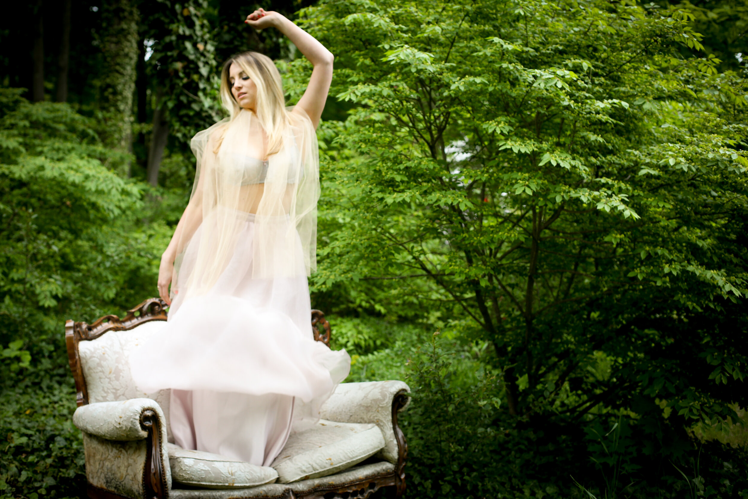 boston boudoir photographer Stephanie Olsen garden goddess sexy woman in lingerie in forest garden ivy vintage settee