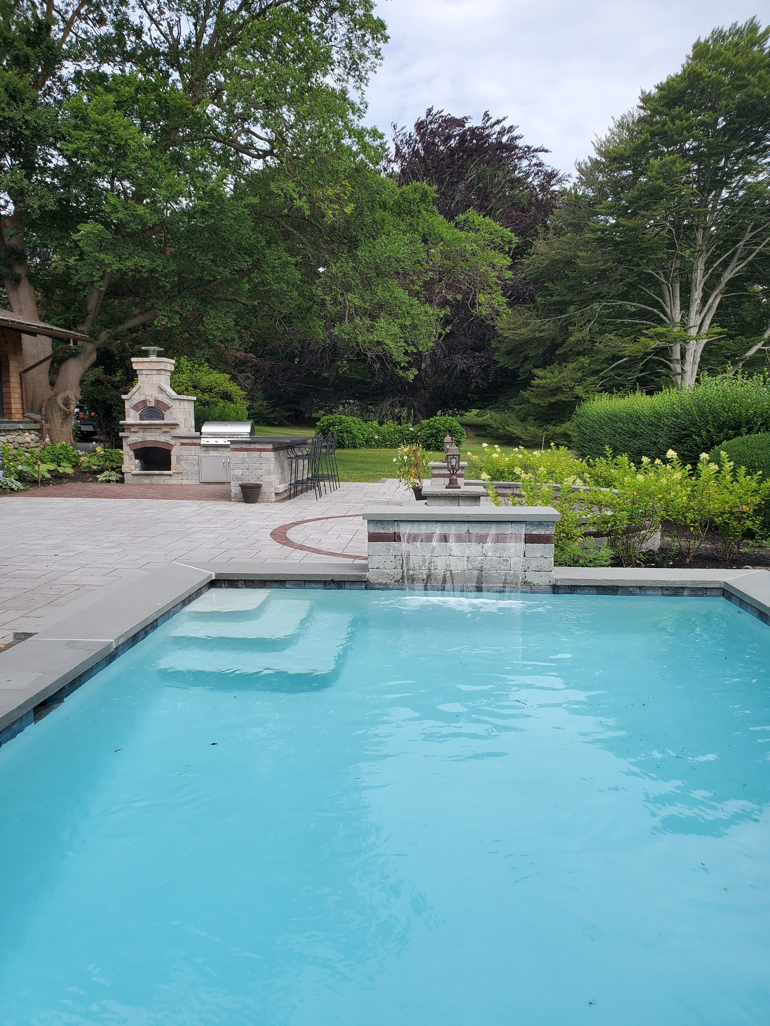 5 Water Features That Landscaping Companies Recommend With an Inground Pool in the Barrington, RI Area