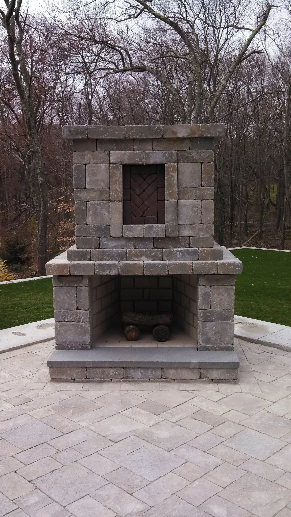 Tips for Making an Outdoor Fireplace the Focal Point of Your Backyard in the Portsmouth, RI Area 