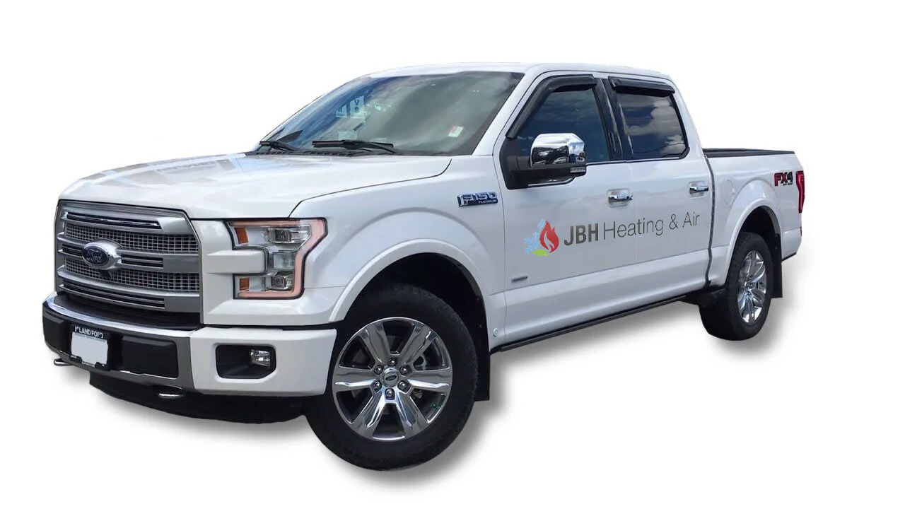 Photo of a white pick up truck with a JBH Heating & Air logo on the doors.