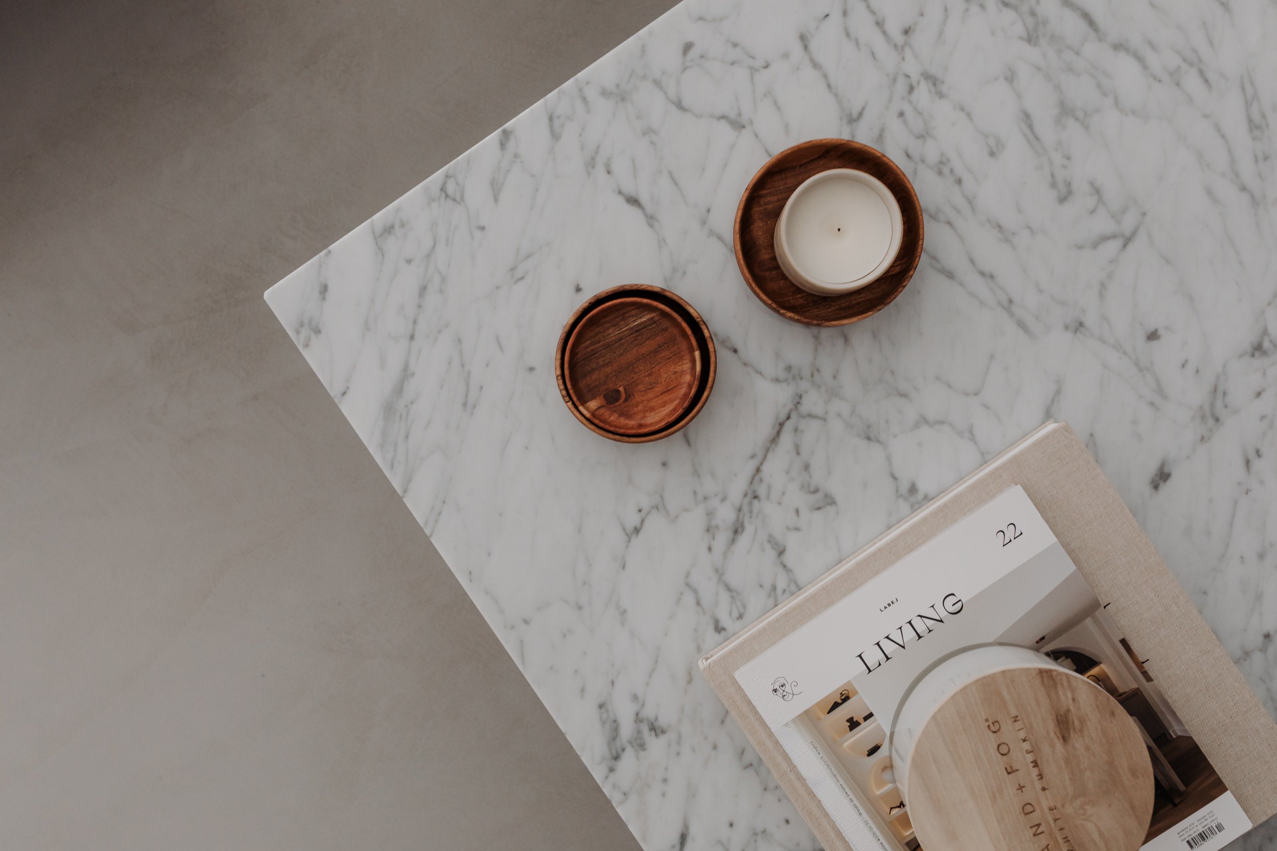 Coffee table with books and wood coaster