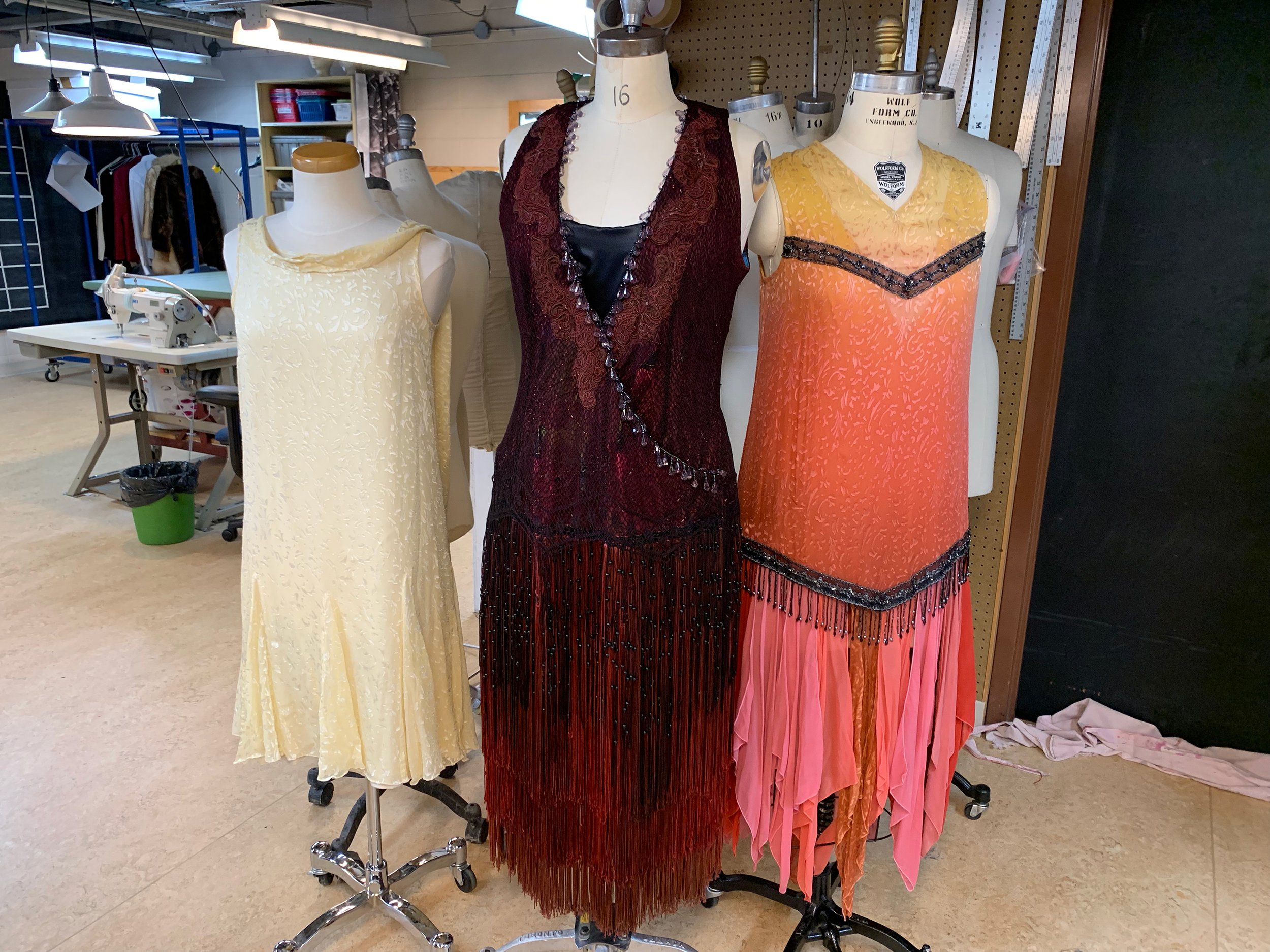  Custom-dyed costumes worn by (l to r) Mairi Babb in  Dracula  (designed by Brian Perchaluk), Kate Hennig in  Cabaret  (designed by Judith Bowden), Kira Bradley in  Counsellor-At-Law  (designed by Jenifer Darbellay). Photo By Christopher Loach. 