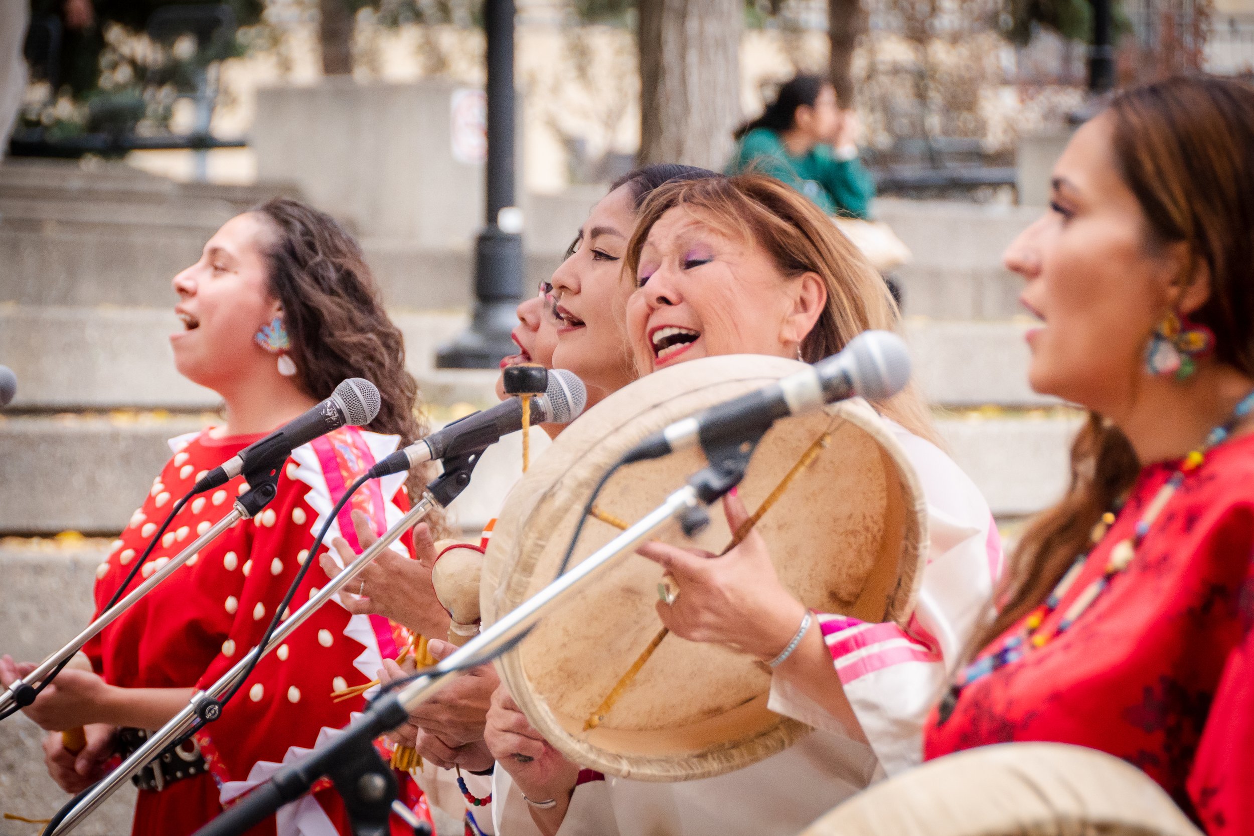  Olivia Tail Feathers and the Kainai Grasslands Singers perform in Olympic Plaza during the National Day for Truth and Reconciliation, September 2022. Photo by Kiani Evans. 