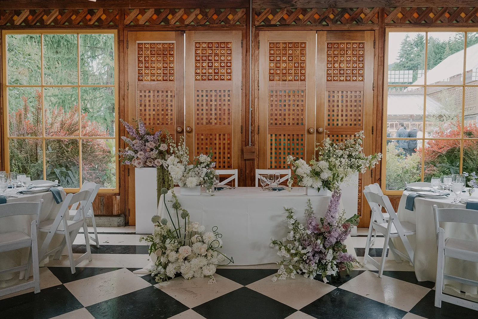 A lush floral installation for the sweetheart table in the Apple House at Mt. Hood Organic Farms