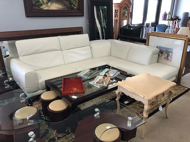 Natuzzi leather sectional. Head rests are adjustable