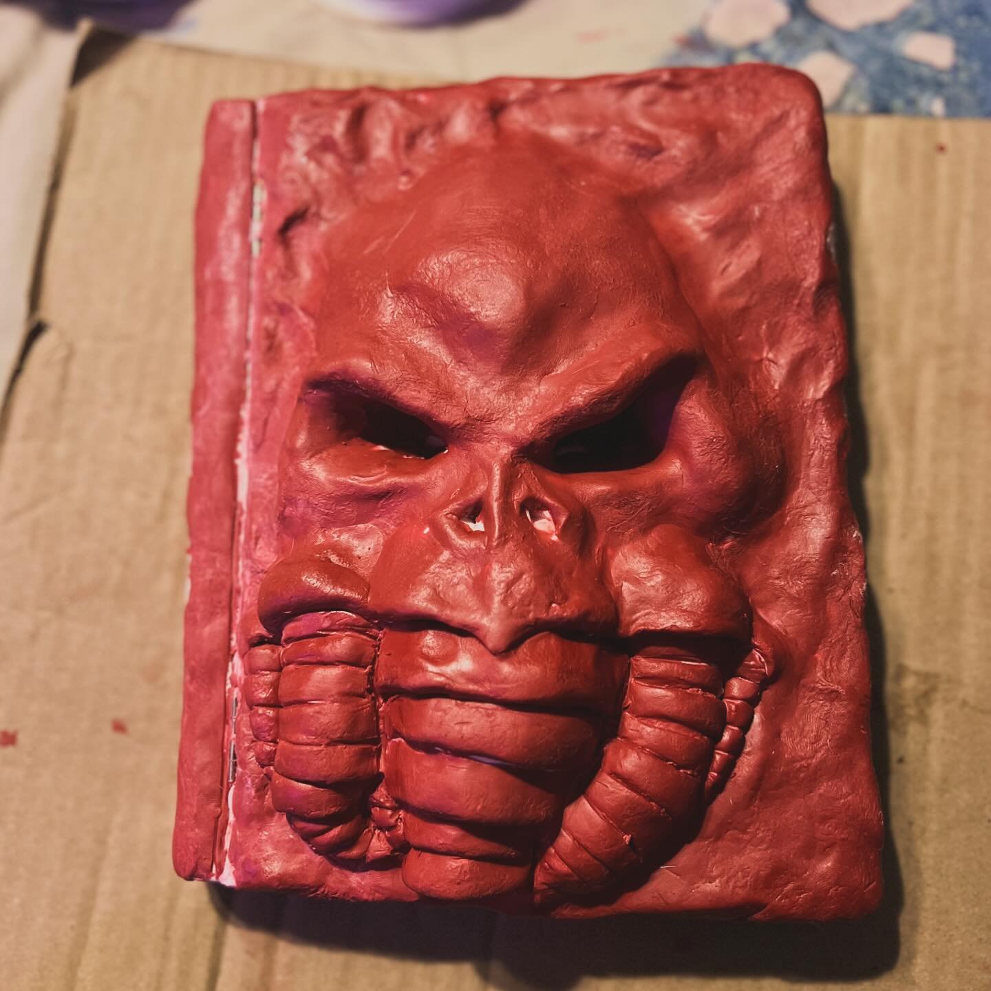 Got the initial layer of hardclay onto the cover of the Necronomicon! 
.
.
#horror #horrorartist #horrorcommunity #horrorart #propmaking #dndfanart #dungeonsanddragons #prop #propmaking #propmaker #warhammercommunity #horrorcommunity #sculptor #sculp