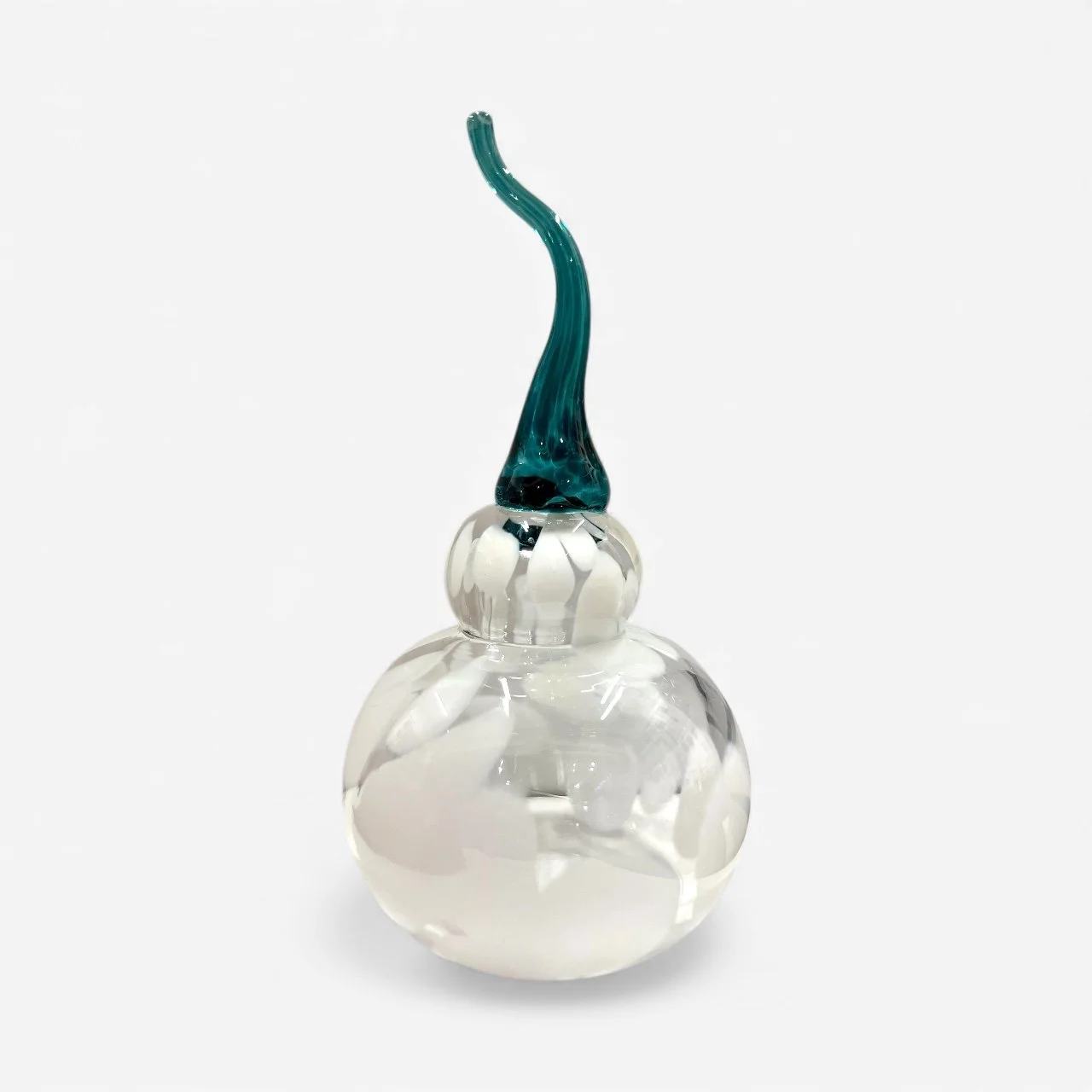 A clear glass snowman with a rounded base and a small head, featuring a twisted blue glass hat emerging from the top.