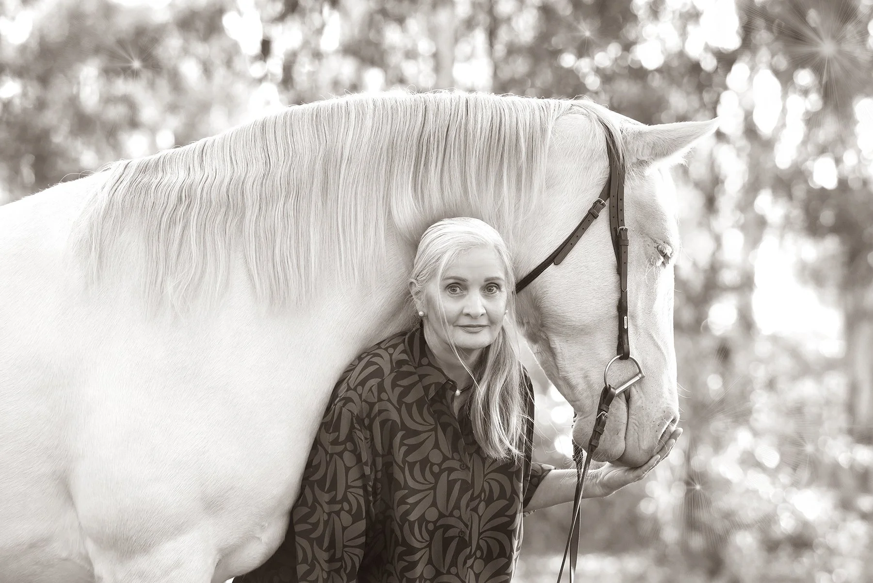 Head bowed together — horse and owner peace, Victoria.