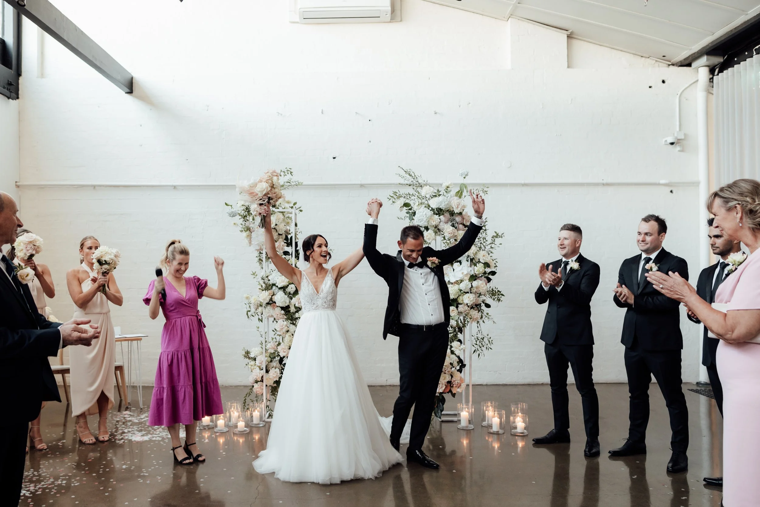 Emily Carr celebrating Megan and Chris's personalised wedding ceremony.