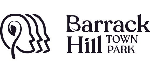 Logo of Barrack Hill Town Park featuring stylized head profiles and text.