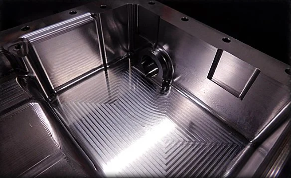 An ARKCNC precision machined engine sump
