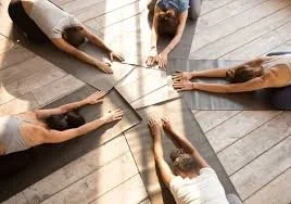 People Doing Yoga Exercises